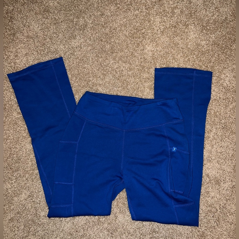 Jaanuu women’s bootcut scrub bottoms. size small. royal blue color